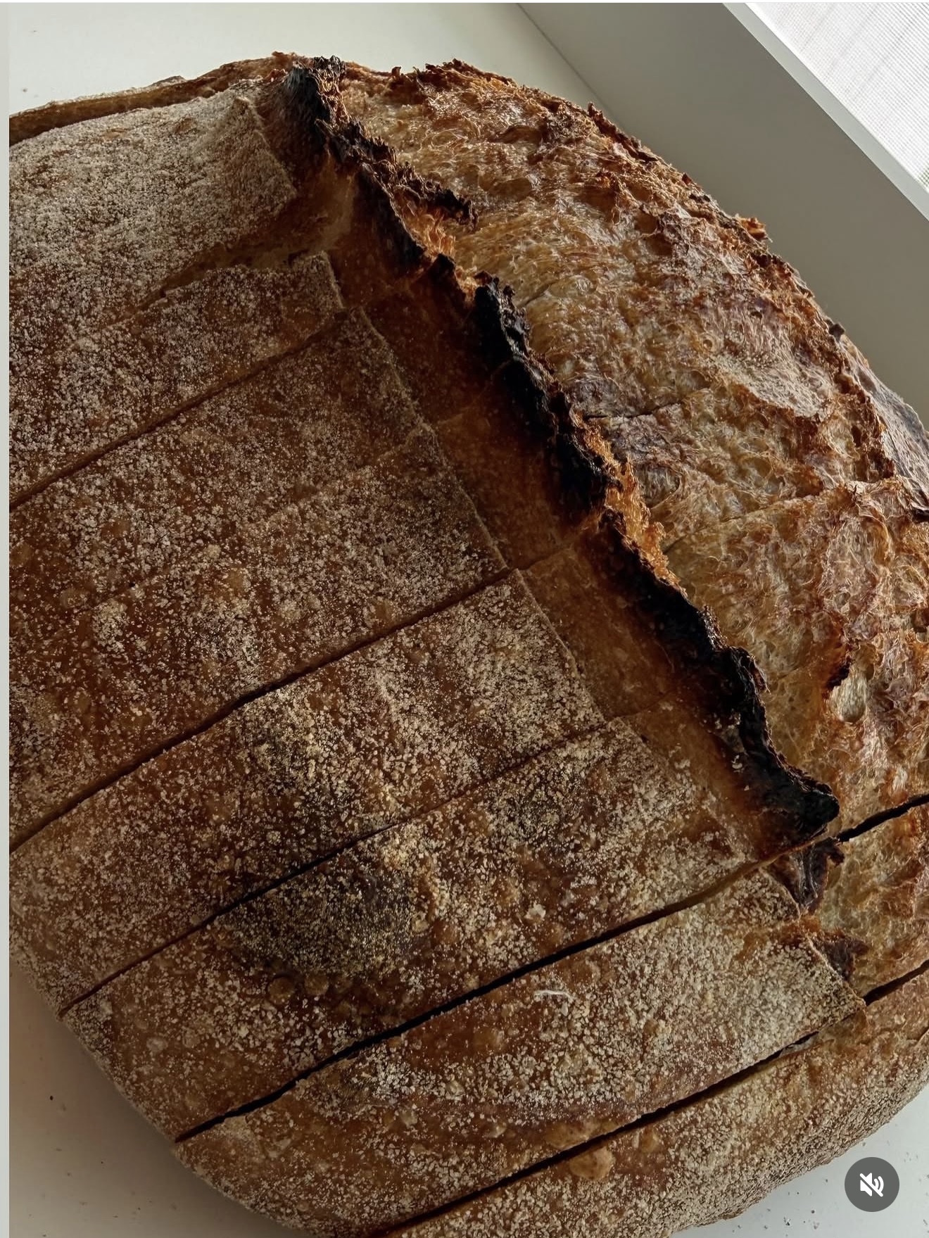 Artisan sourdough bread with a golden, scored crust